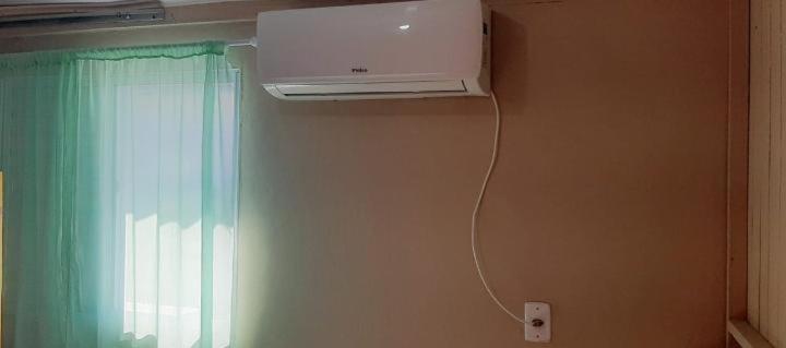 Kitnet K1 Em Torres-Rs - Na Mais Bela Praia Gaucha - Cozinha - Banheiro - Ar Condicionado - Smart Tv 32' - Wi-Fi - Anfitria Superhost No Bnb Exterior photo
